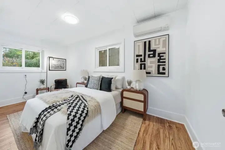 Welcome to your cozy bedroom, tucked at the back of the home for a peaceful sense of privacy.