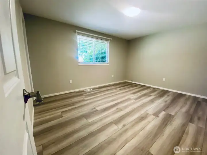 Large primary bedroom faces the backyard, and is large enough for king-sized bed.