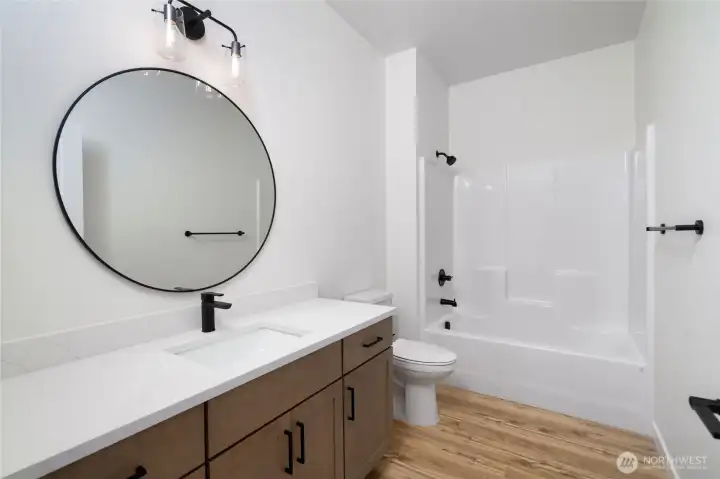 Guest Bathroom. Pics are of a different 1785 plan. Features and colors may differ.