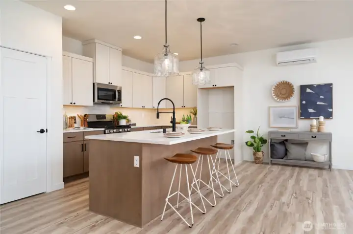 Kitchen - Pics are of a different 1785 plan. Features and colors may differ.