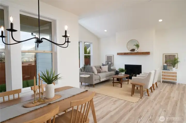 Dining area and living room - Pics are of a different 1785 plan. Features and colors may differ.