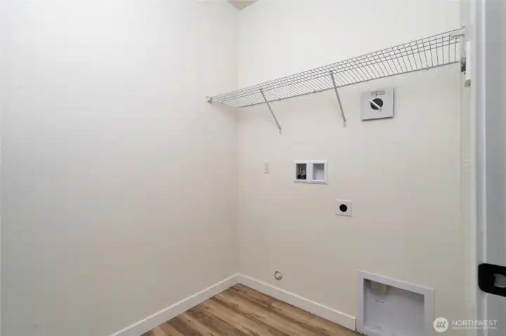 Utility room. Pics are of a different 1785 plan. Features and colors may differ.