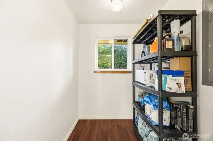 Pantry or extra storage just off laundry room.