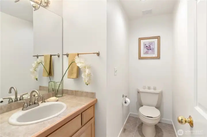 Guest half bath on main level.