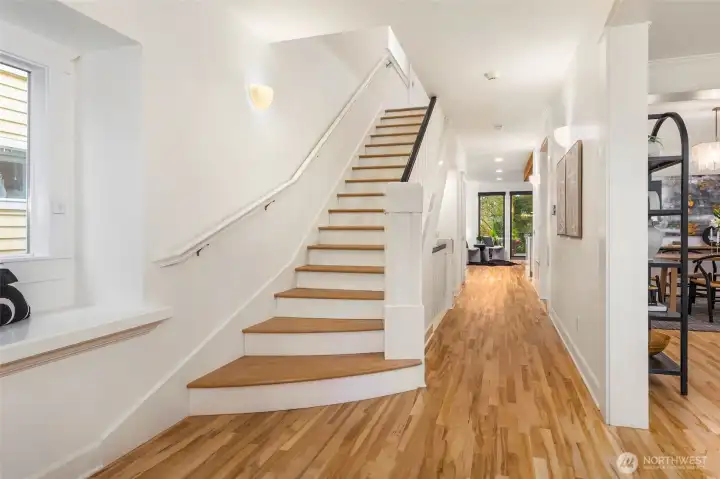 Soaring ceilings create an airy, welcoming ambiance throughout the main level.