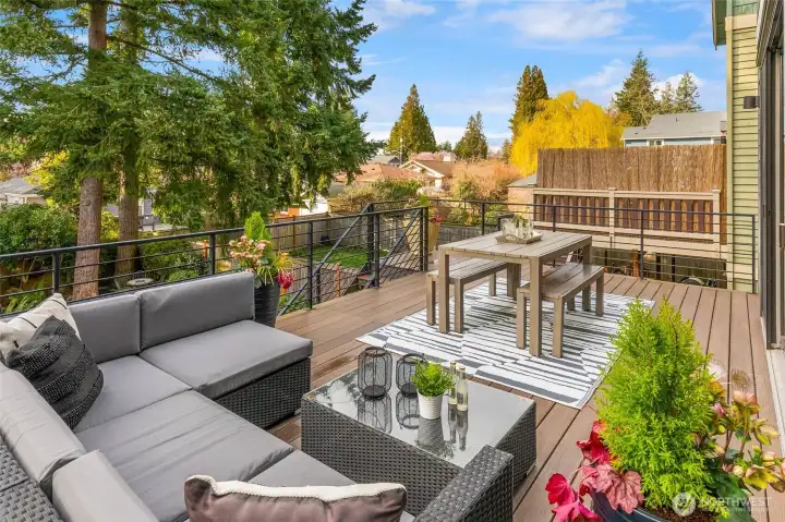 Large deck looking over the tranquil west facing yard.