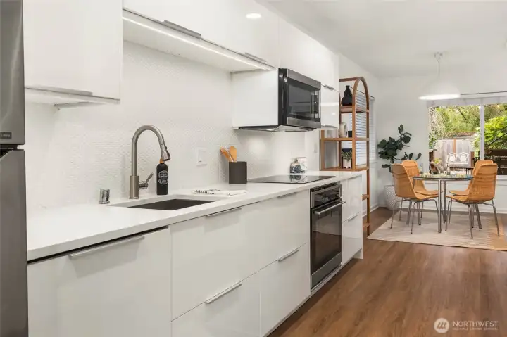 Modern galley kitchen in the lower level.