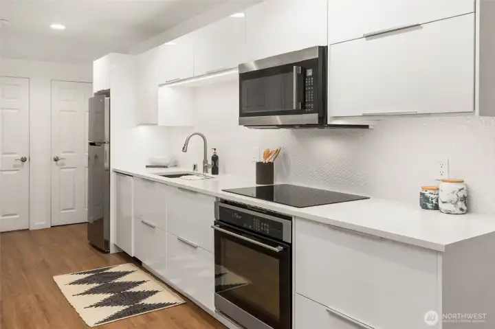 Modern galley kitchen in the lower level.