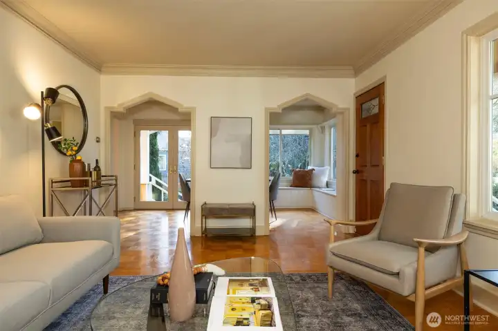 Parquet floors and original millwork and trim in the living room.