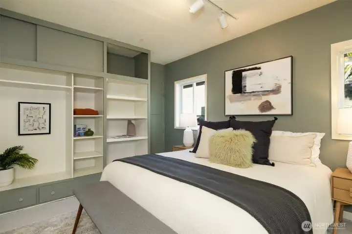 Primary bedroom accommodates a king size bed easily.