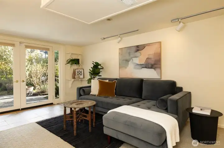 Another set of French doors lead to the backyard.