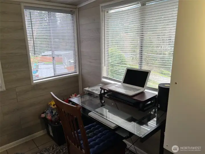 A corner of the sunroom, and the view down to the water.