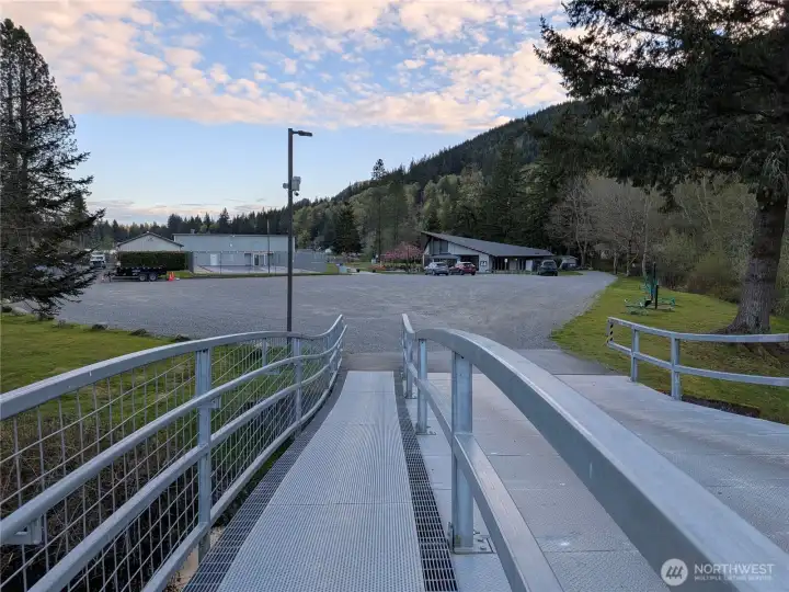 Over the bridge to the community area.
