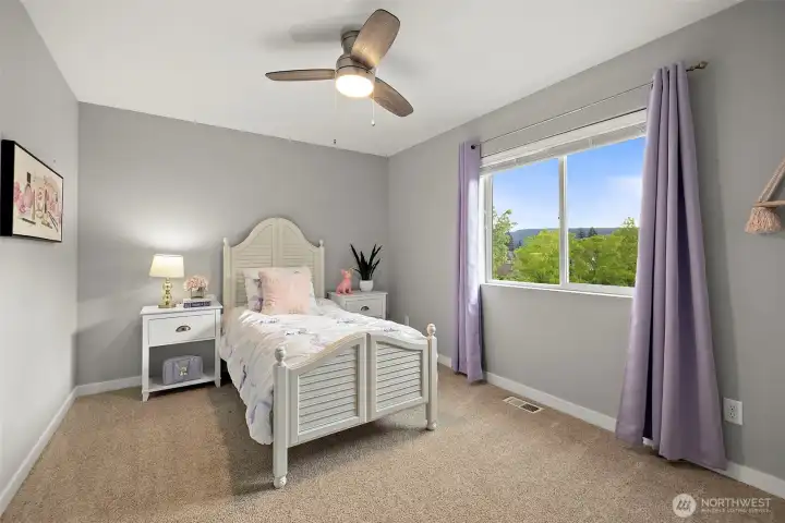 Bedroom 2 overlooking back with a little view
