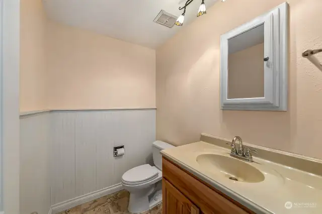 Powder room near the front entry.