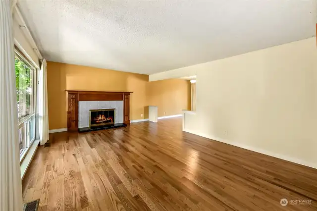 Living room with a wooden fireplace