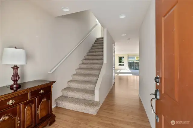 Large entry with easy access to Living area on the main floor and upstairs.