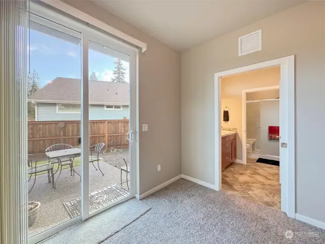 Sliding Door to Private Patio in Primary Bedroom