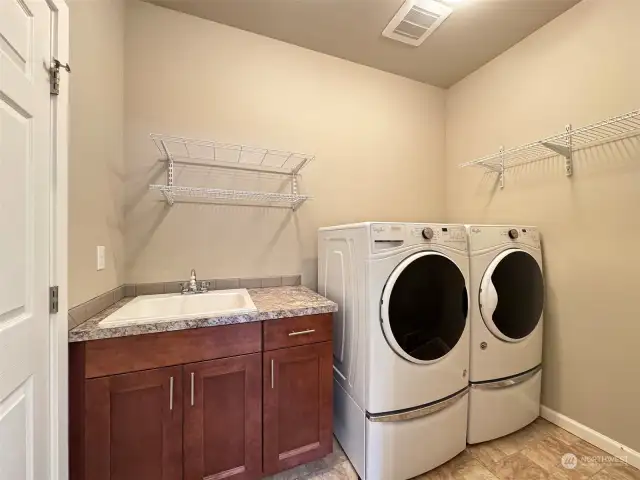 Laundry Room w/ Sink and W/D on Pedestals