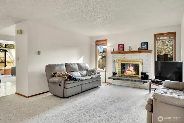 Unit B - Living Room with fireplace.