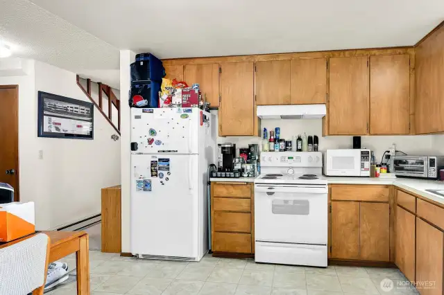 Unit A - Eat in kitchen with lots of storage.