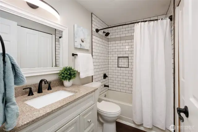 Updated full hall bathroom.