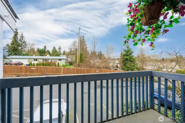 Relax on the deck that includes storage.