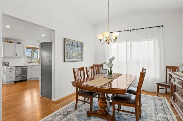 The off-kitchen dining room is bright and spacious.    It's the perfect size for a large dining room table, seating all your friends and family.