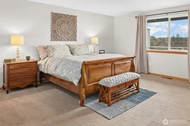 The primary bedroom is larger than most and features a walk in closet and full bath.