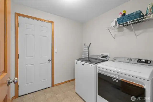 Laundry/utility room with door to garage.