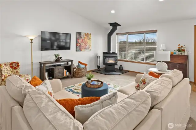 The cozy wood stove is both charming and efficient.