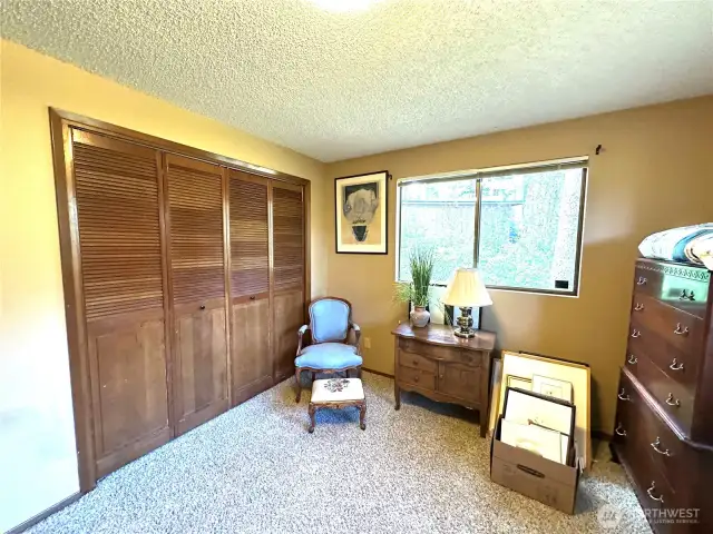 Bedroom 2 is spacious with lots of natural light.
