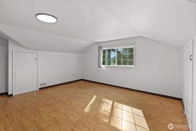 Upstairs bedroom with beautiful natural light.