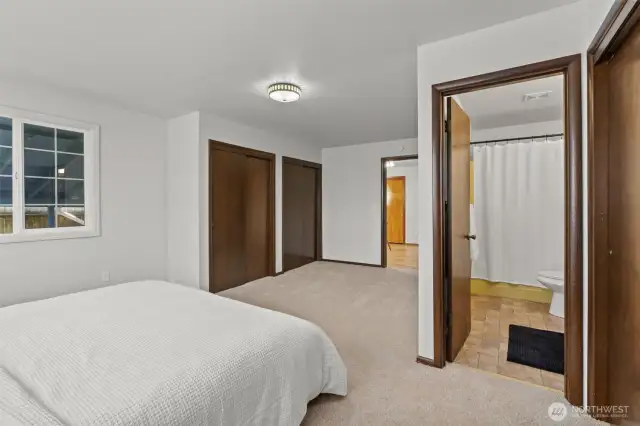 Lots of closet space on both sides of primary bedroom.