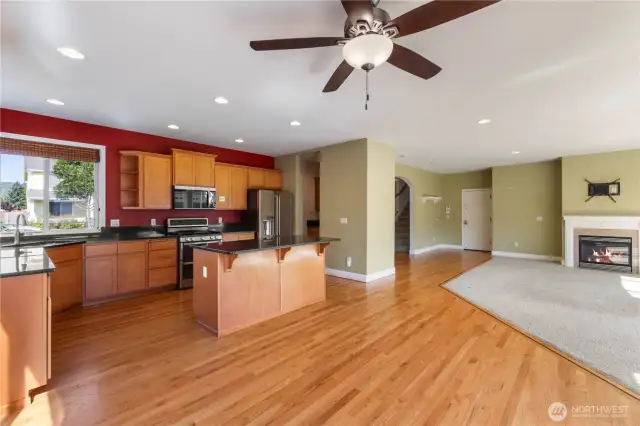 Spacious and light-filled, the separate eating area features a ceiling fan for comfort and seamlessly opens to the great room. A sliding glass door leads to the patio and backyard, where you’ll find a relaxing hot tub—perfect for unwinding at the end of the day.
