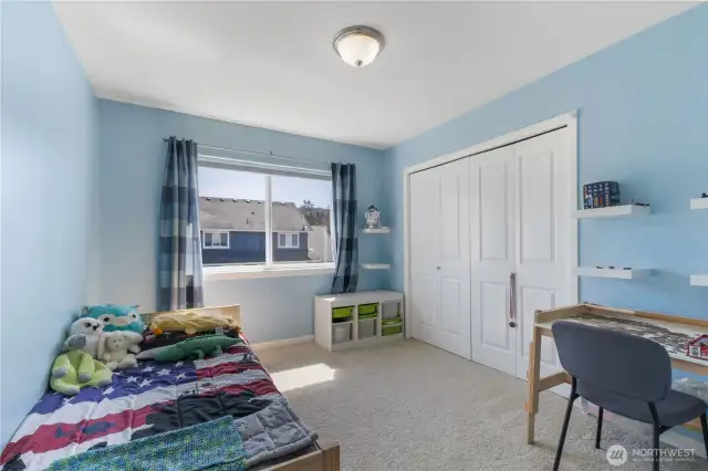 The third bedroom features a large closet and is located close to the main bathroom.