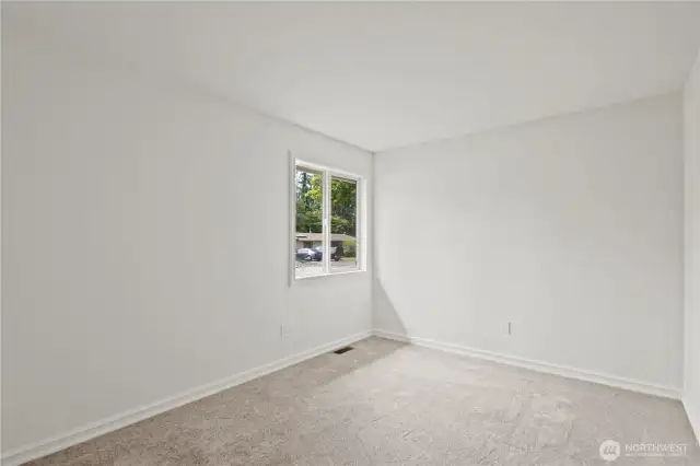 Additional space with a closet that would be perfect for a home office, hobby room or additional bedroom.