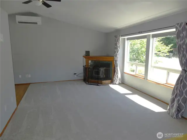 Large Living Room With Efficient Pellet Stove & Mini Split Heating and Cooling