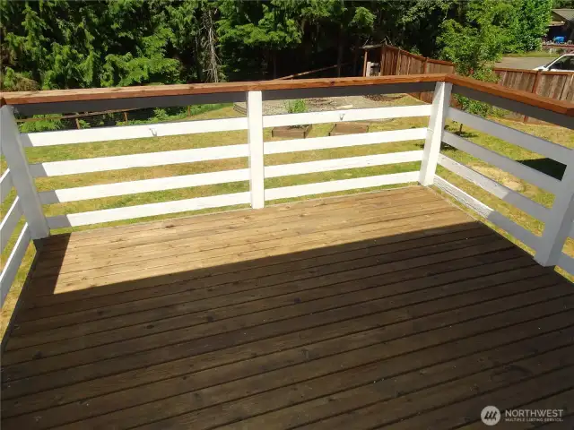 Deck Off Dining Room Over looks Backyard and Has A Partial View Of Mnt Pilchuck.
