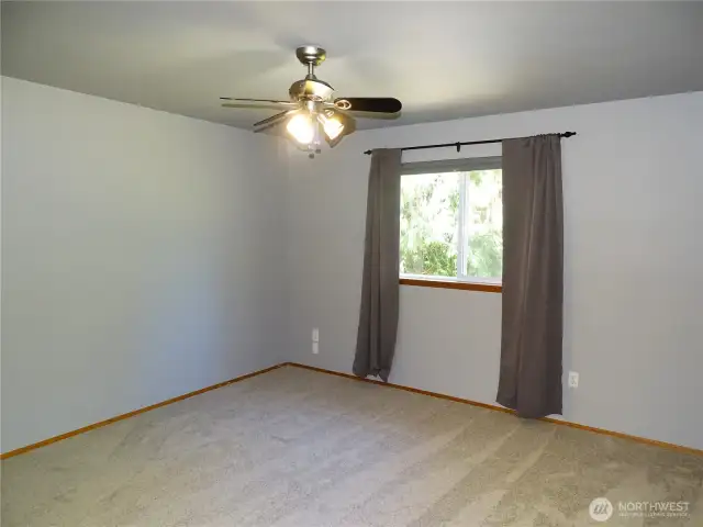 Primary Bedroom With A Bathroom Connected.