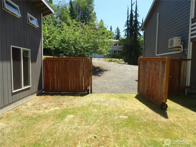 Large Double Gate Can Fully Open To Bring An RV Into The Backyard. Center Pole Is Removable.