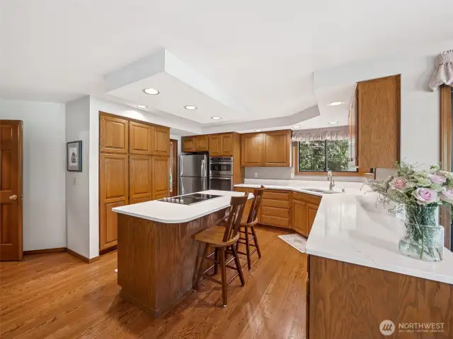 Spacious Kitchen with Island and a View