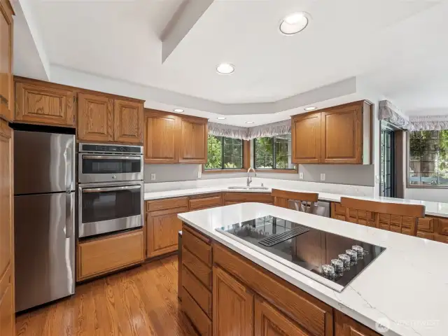 Spacious Kitchen with Island and a View