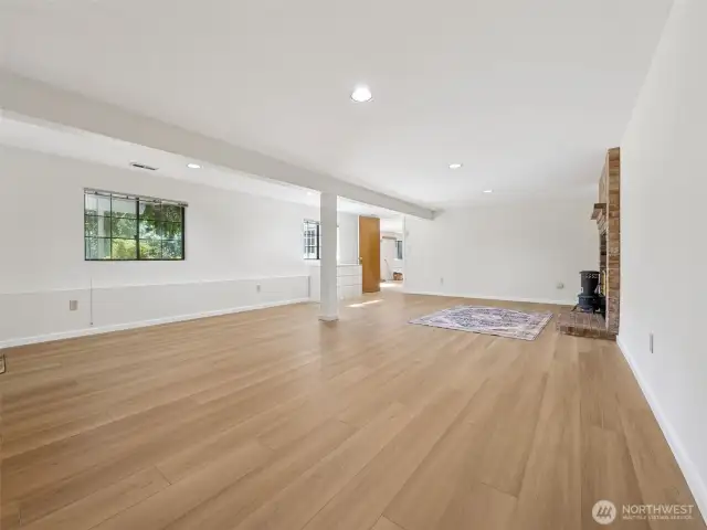 Lower Level Flex Space w/ Powder Room and Woodstove - could be a Studio Apartment, a Rec Room, an Office, etc