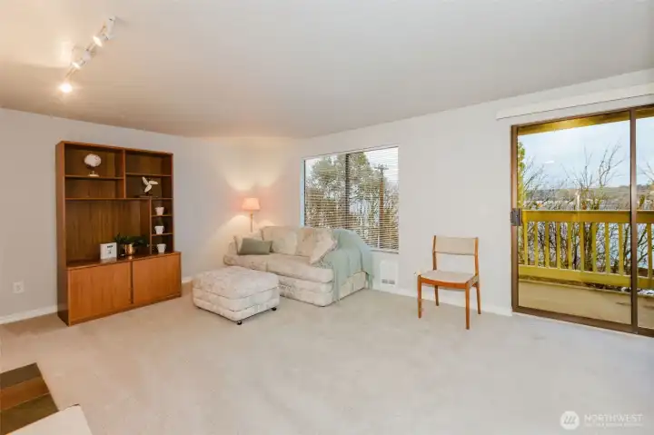 Living room with slider to covered patio