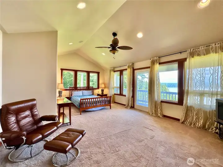 The second-floor primary has living space, a large ensuite and walk-in closet as well as its own private balcony.