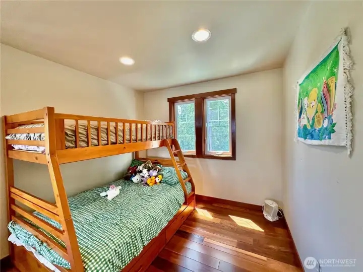The fourth bedroom can double as a rec room or flex space.  It’s huge!