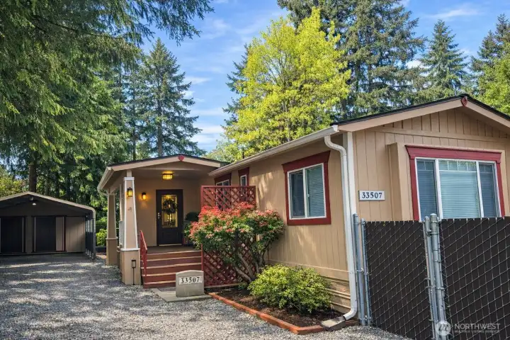 Tucked away in privacy! Immaculate home on over half an acre!