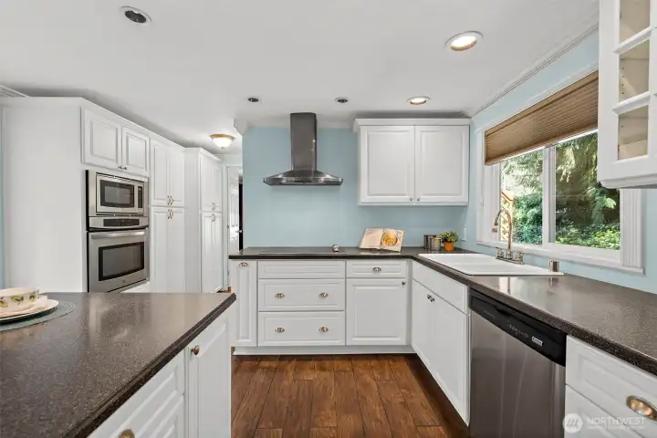 Tons of space for cooking, kitchen gadgets, and too many cooks in the kitchen!
