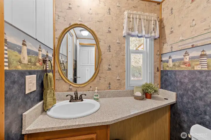 Main three quarter bath is accessible through the main hallway or the second bedroom.